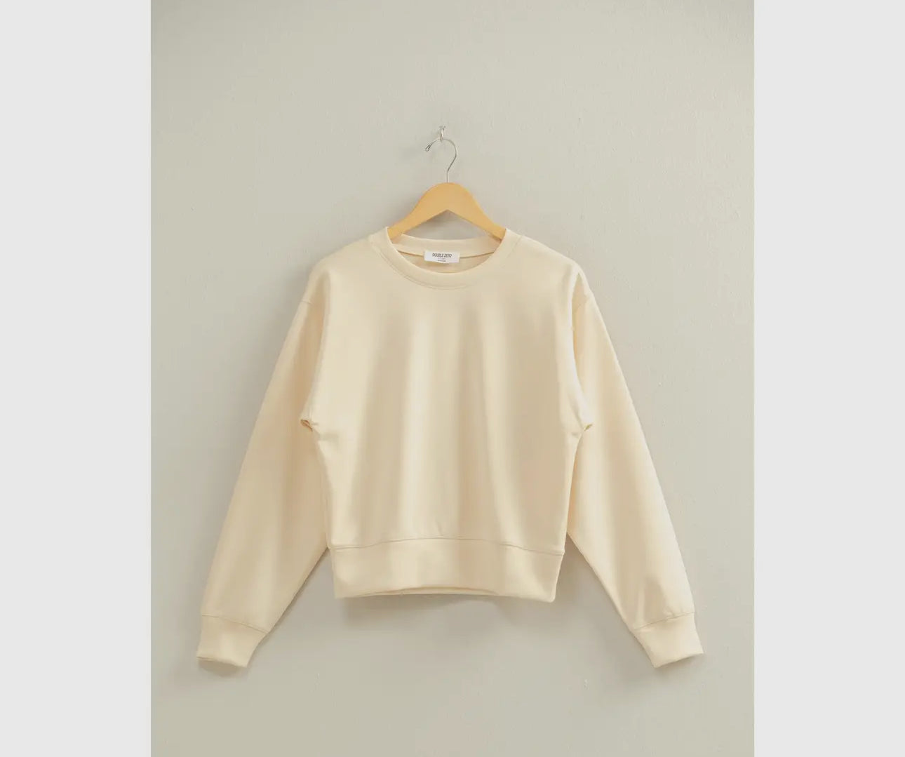 Cream crew neck sweatshirt