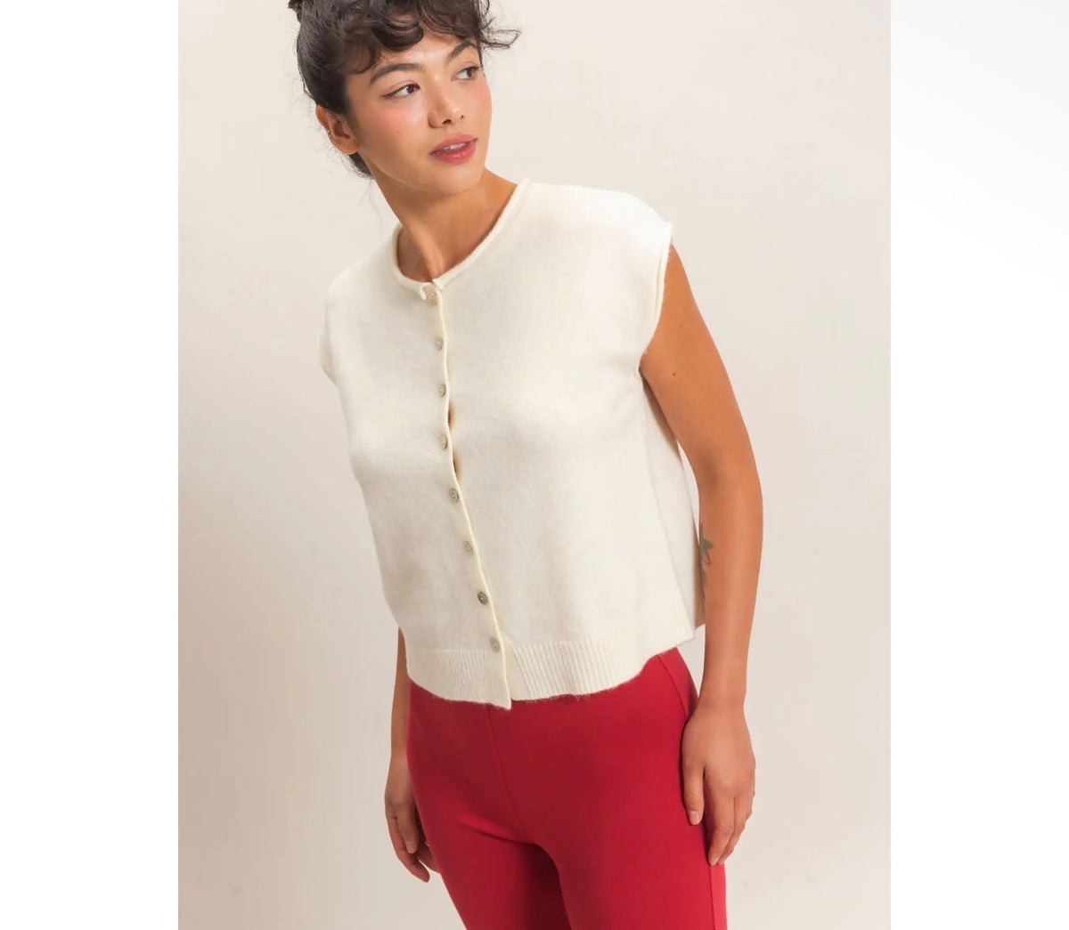 White sleeveless cardigan